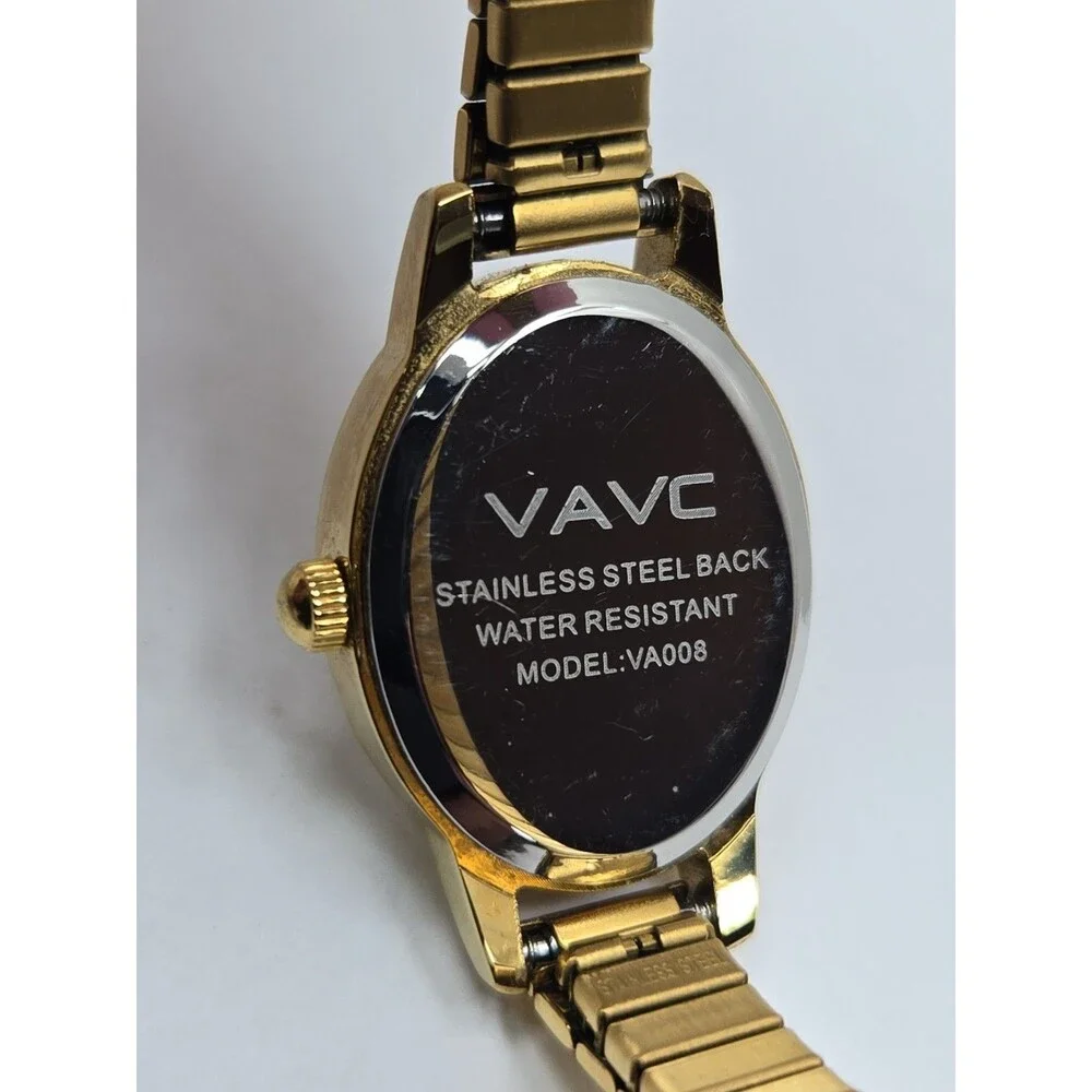 VAVC Womens Goldtone Oval Roman Numeral Expansion Quartz Dress Watch New Battery